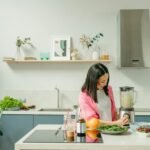 Women making smoothie